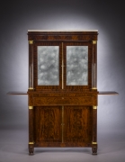 Cabinet with Mirrored Doors, about 1820. Attributed to Duncan Phyfe (1770–1854), New York. Mahogany, with ormolu capitals and bases, gilt-brass door moldings, keyhole liners, and knobs, marble, and mirror plate 78 5/8 in. high, 35 in. wide, 22 in. deep (overall). Frontal view, with slides extended.