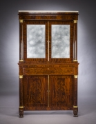Cabinet with Mirrored Doors, about 1820. Attributed to Duncan Phyfe (1770–1854), New York. Mahogany, with ormolu capitals and bases, gilt-brass door moldings, keyhole liners, and knobs, marble, and mirror plate 78 5/8 in. high, 35 in. wide, 22 in. deep (overall). Frontal view.