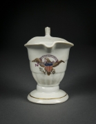 Helmet-Shaped Creamer with the Seal of the United States and the Motto &ldquo;DONT GIVE UP THE SHIP,&rdquo;&nbsp;about 1813&ndash;15Chinese, for the American MarketPorcelain, partially painted and gilded5 1/4 in. high (to top of handle)