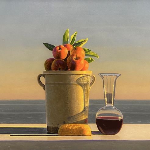 a still-life painting by David Ligare of apples in an earthenware pot, wine in a carafe, and a Twinkie on a table by the sea