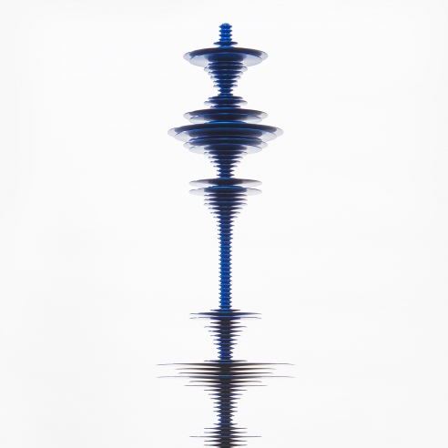 a sculpture by Elizabeth Turk of dark blue aluminum discs stacked and arranged to simultaneously resemble a Modernist abstraction and a sound wave